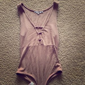 Tan body suit